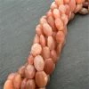 Precious Sparkle Peach Moonstone Faceted Ovals 15" Strand