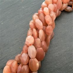 Precious Sparkle Peach Moonstone Faceted Ovals 15" Strand