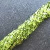 Precious Sparkle Peridot Faceted Oval Beads 15" Strand